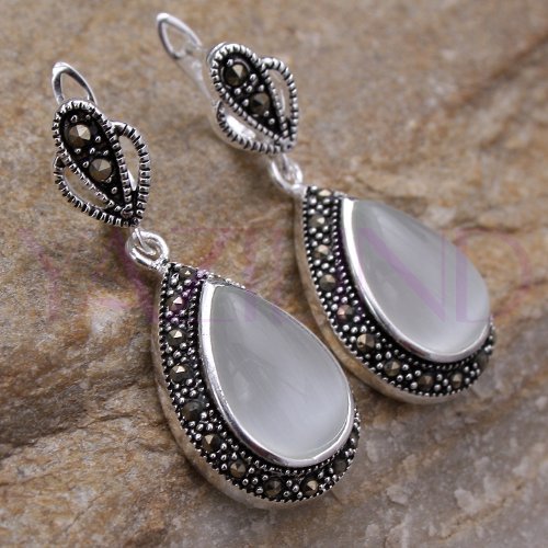 Qiyun Oval Ohrstecker